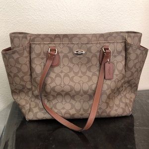Coach diaper bag with changing pad